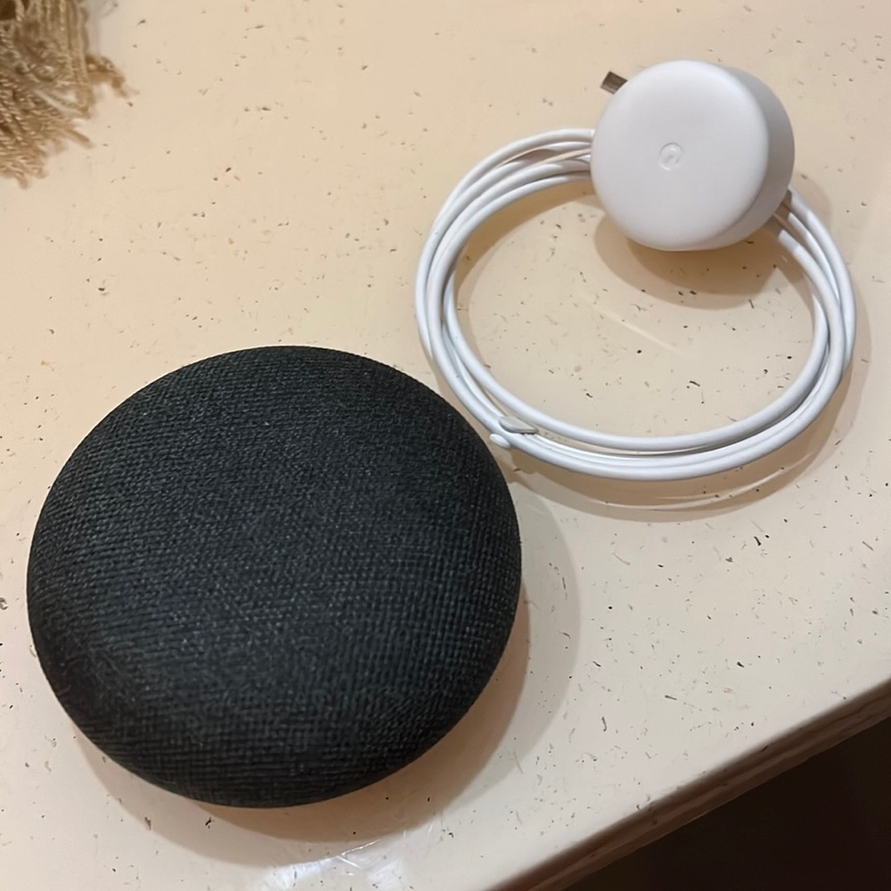 Google home mini. Dark grey. With cable. Everything works great. New (no box)